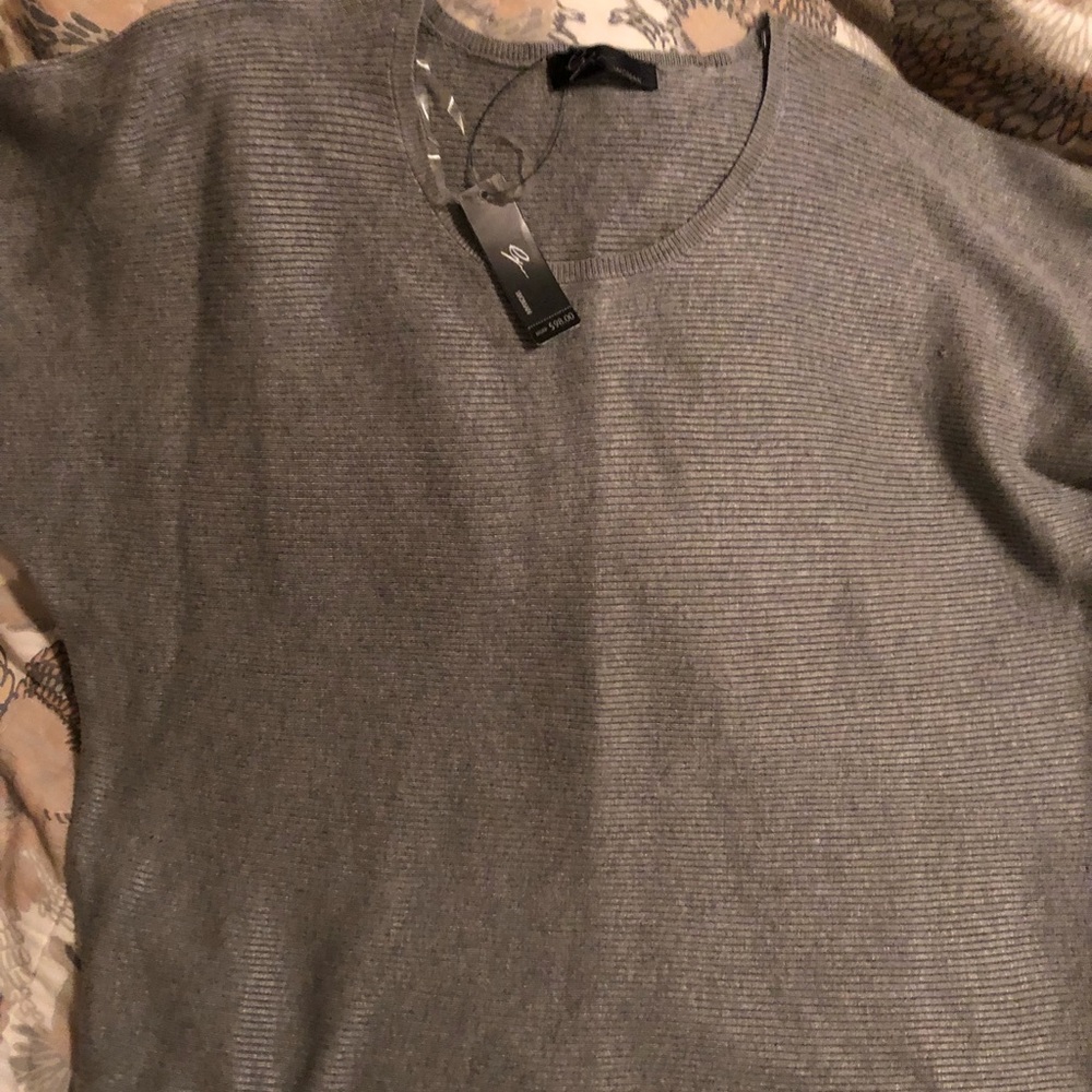 Size 1x super soft stretchy over size sweater